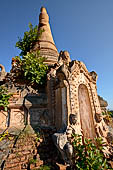 Inle Lake Myanmar. Indein, a cluster of ancient stupas  ruined and overgrown with bushes, just behind the village. 